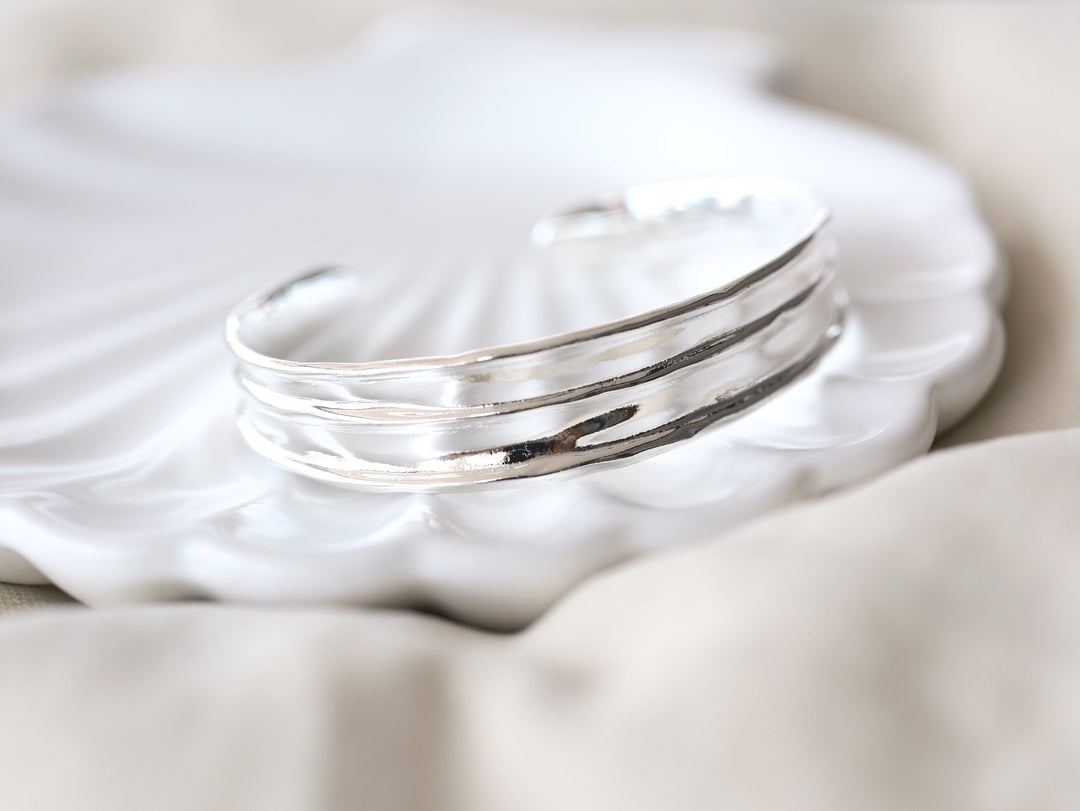 Wide silver bangle with handmade finish - Alicia&