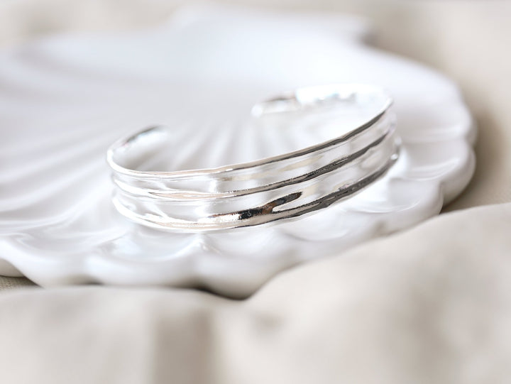 Wide silver bangle with handmade finish - Alicia&