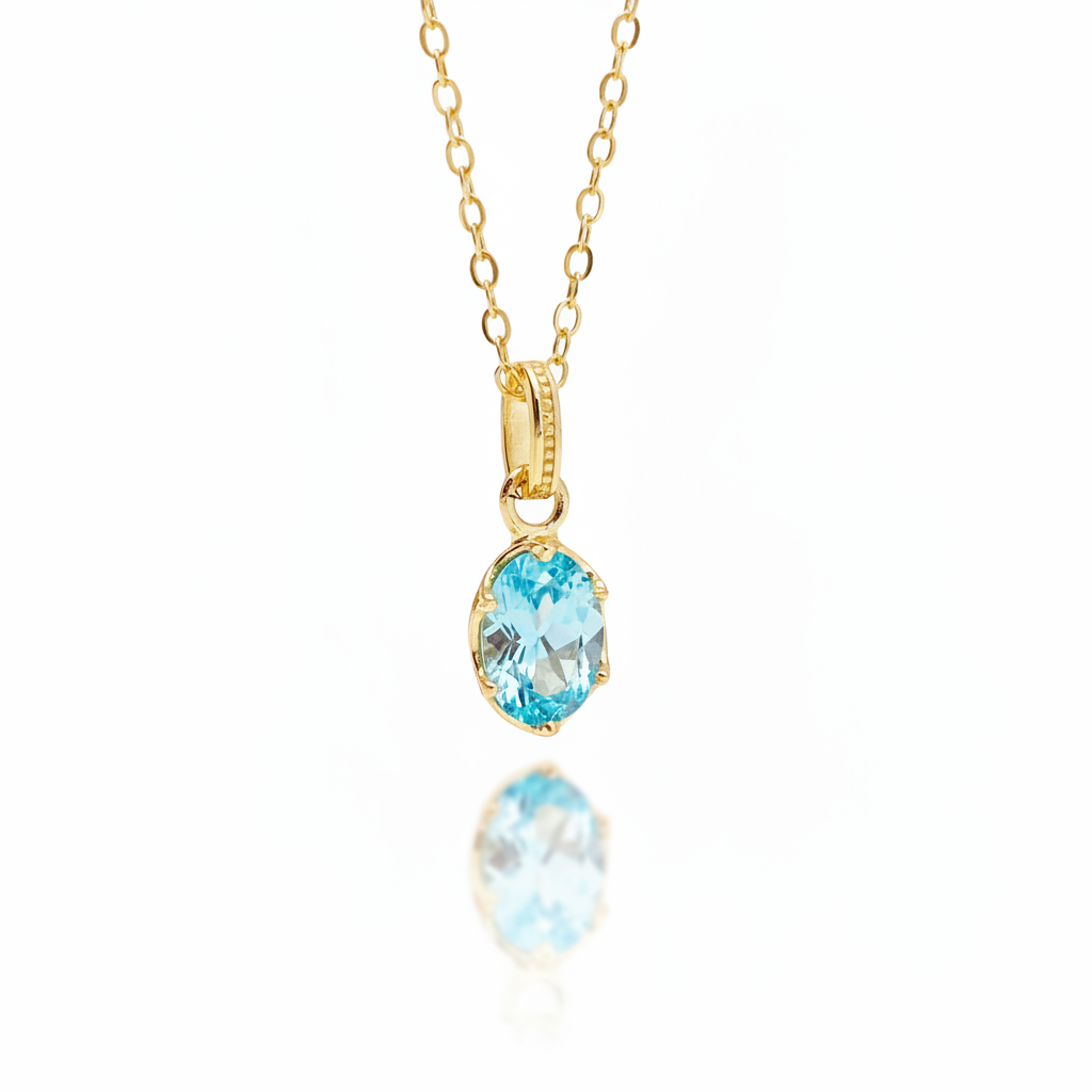 Goldene Halskette mit aquamarin-blauem Kristall in besonderer aufwendiger Fassung aus vergoldetem 925 Sterlingsilber, Schmuck für junge Frauen