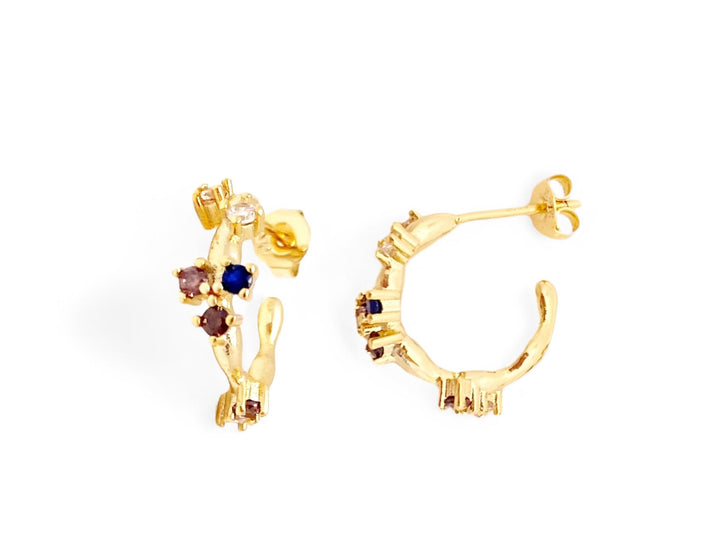 Goldene Huggies mit bunten Steinen