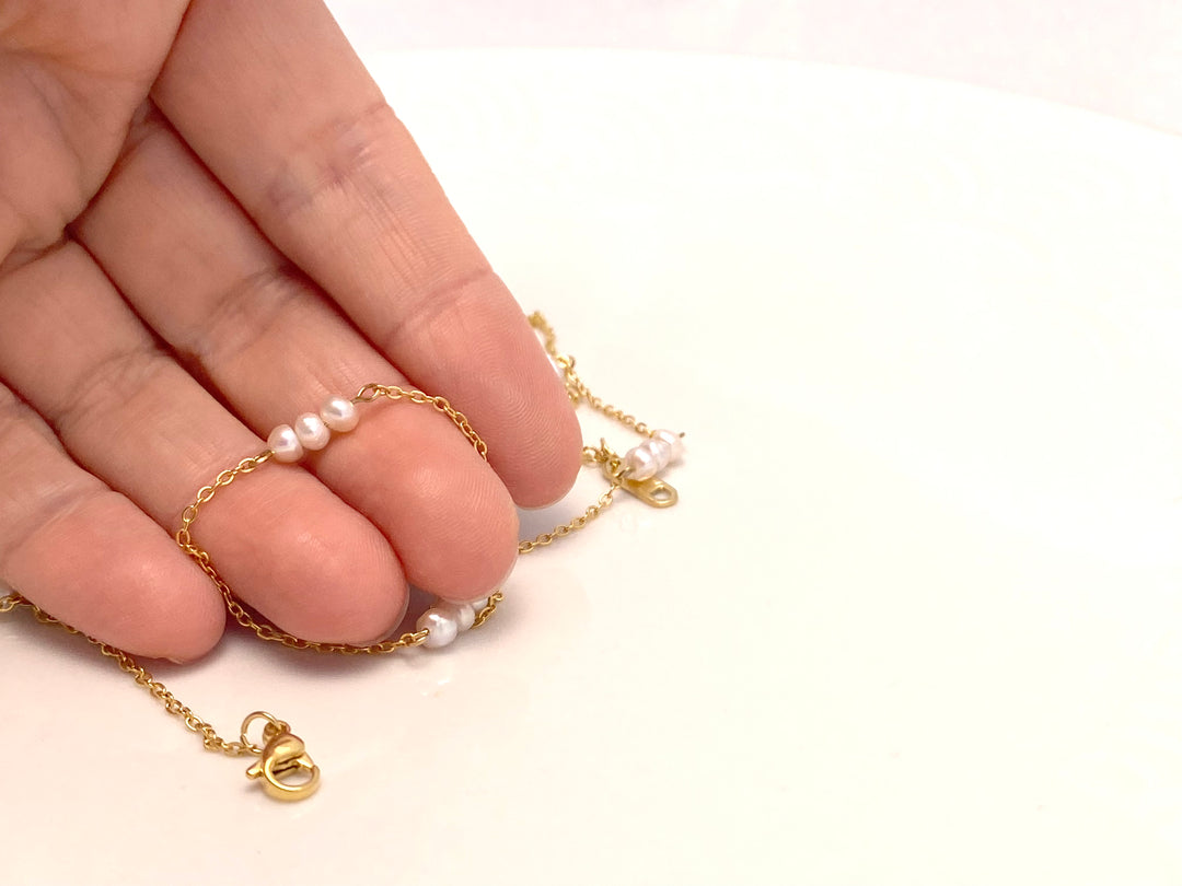 Pearl choker gold