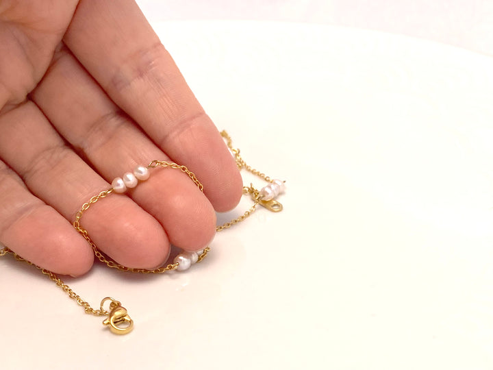Pearl choker gold