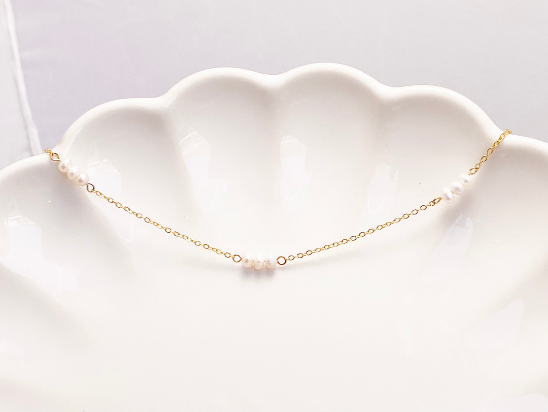 Pearl choker gold