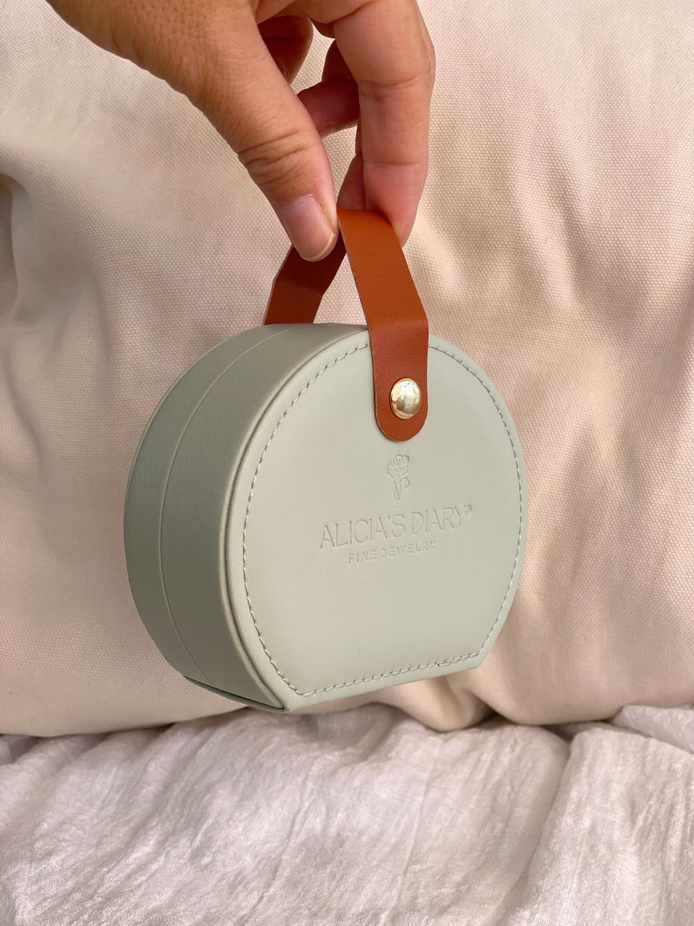 Small green round jewelry box