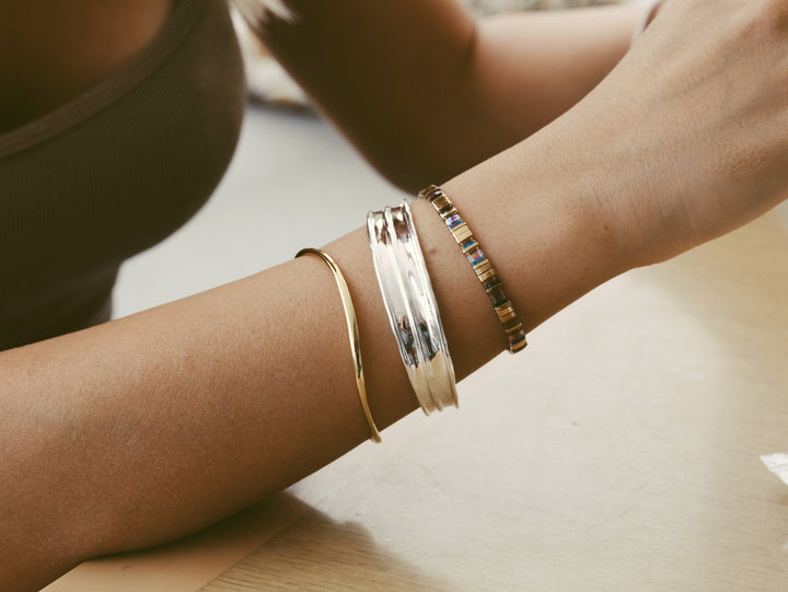 Wide silver bangle with handmade finish - Alicia&