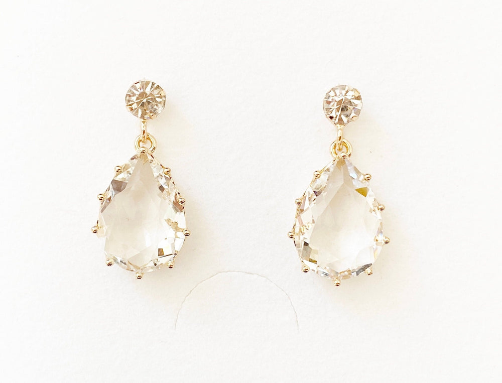 Boucles d'oreilles clips de mariée Gloria avec gouttes de verre étincelantes dans une monture dorée