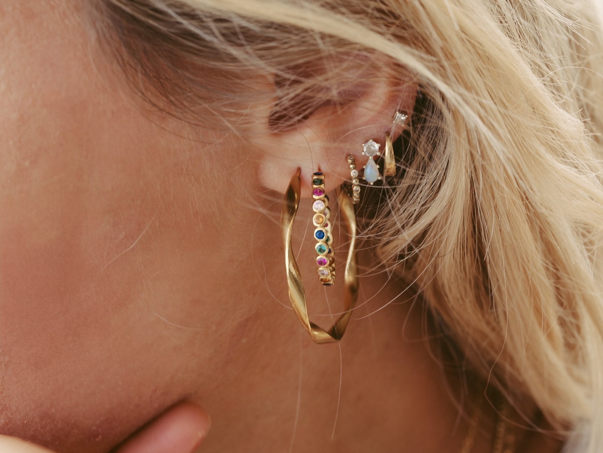 Gold hoop earrings with colorful stones, twisted stainless steel hoop earrings, opal stud earrings, small huggie earrings from Alicia's Diary