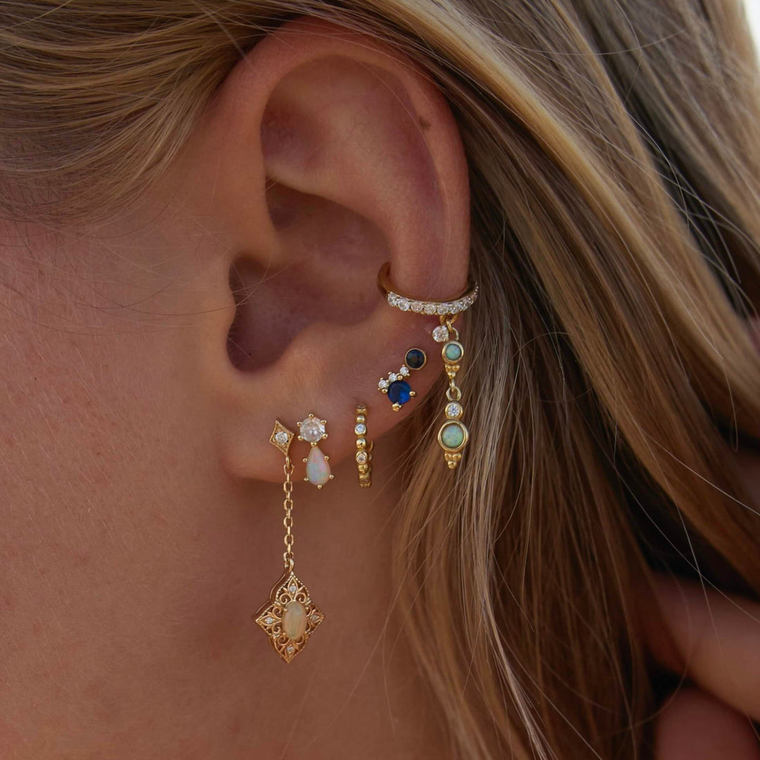 Conjunto de pendientes de oro con pendientes de plata antibacterianos azules para apilar, con cristales, de Alicia&