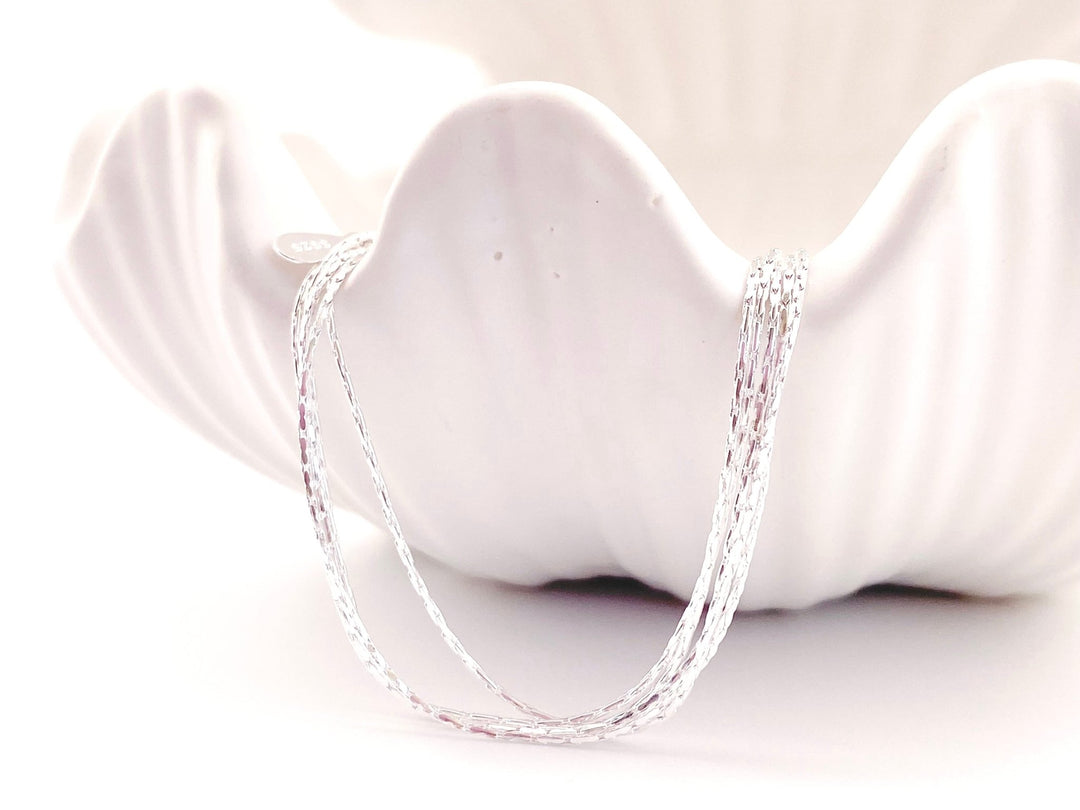 Silbernes Armband mit vielen Lagen, Ketten, Layering, Stacking von Alicia's Diary