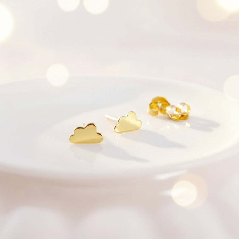 Gold, skin-friendly stud earrings with clouds from Alicia's Diary