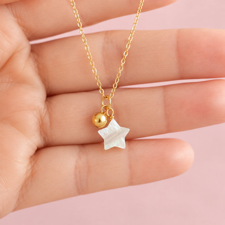 Delicate necklace with multiple pendants made of gold-plated silver, star, sphere, jewelry for young women and teenagers from Alicia&
