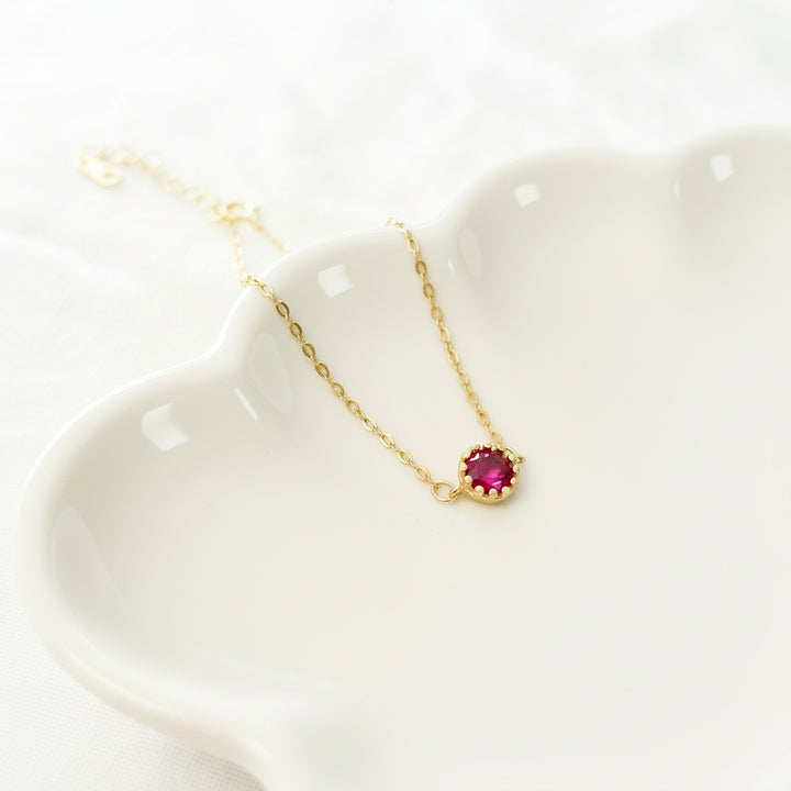 Gold bracelet with raspberry-colored stone - Alicia&