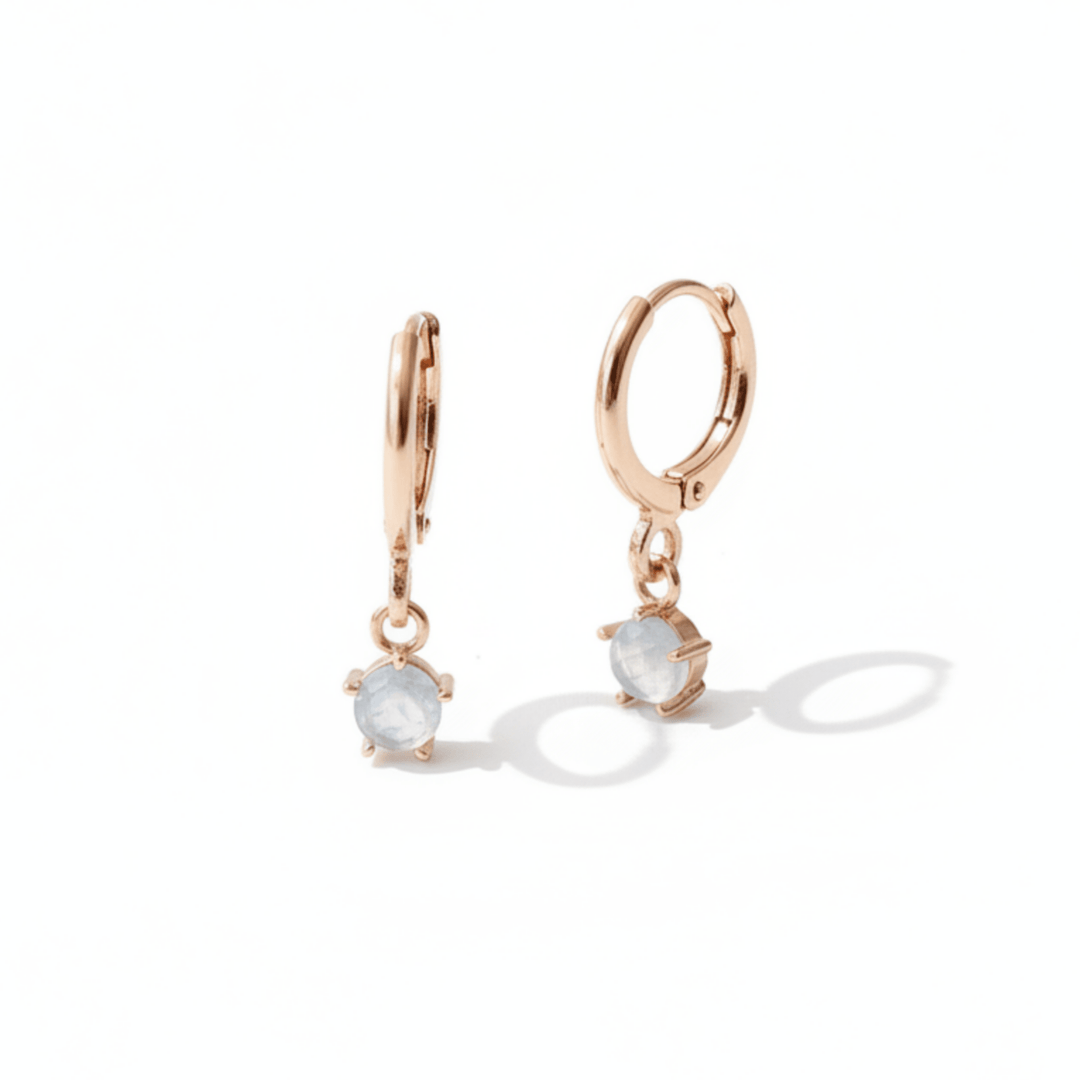 Rosegoldene Creolen mit Anhänger, Aquamarin Ohrringe rosegold hängend mit blauem Stein, moderne Schmuckmarke aus Deutschland