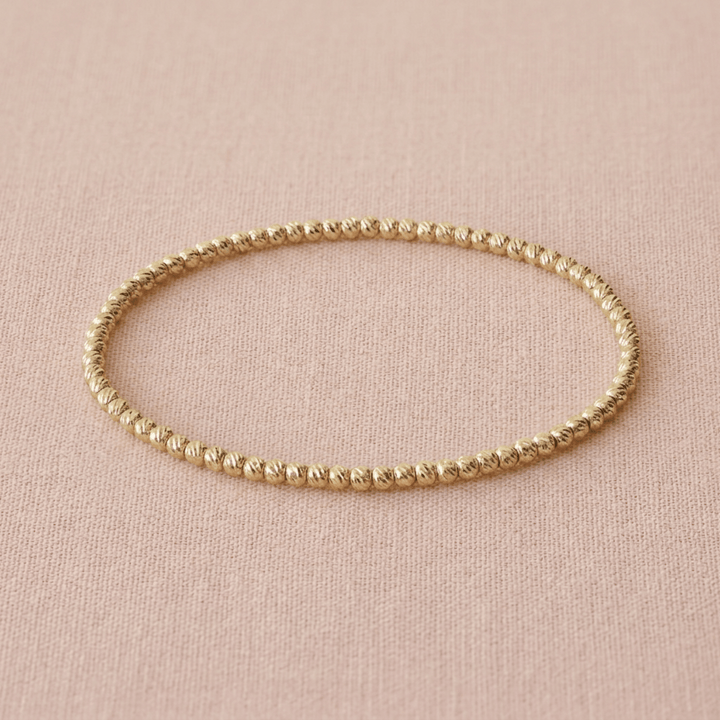 Goldenes Edelstahl Bracelet mit brushed Perlen, Stapel Armband, Schmuck Layering, wasserfester hypoallergener Schmuck