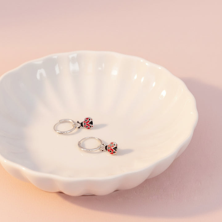 Silver hoop earrings with ladybugs made of 925 sterling silver for girls, waterproof and skin-friendly by Alicia&
