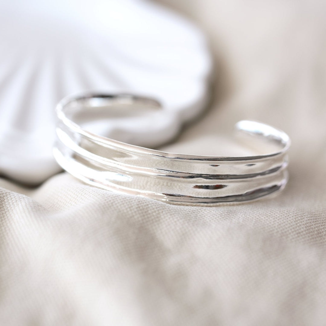 Wide silver bangle with handmade finish - Alicia&