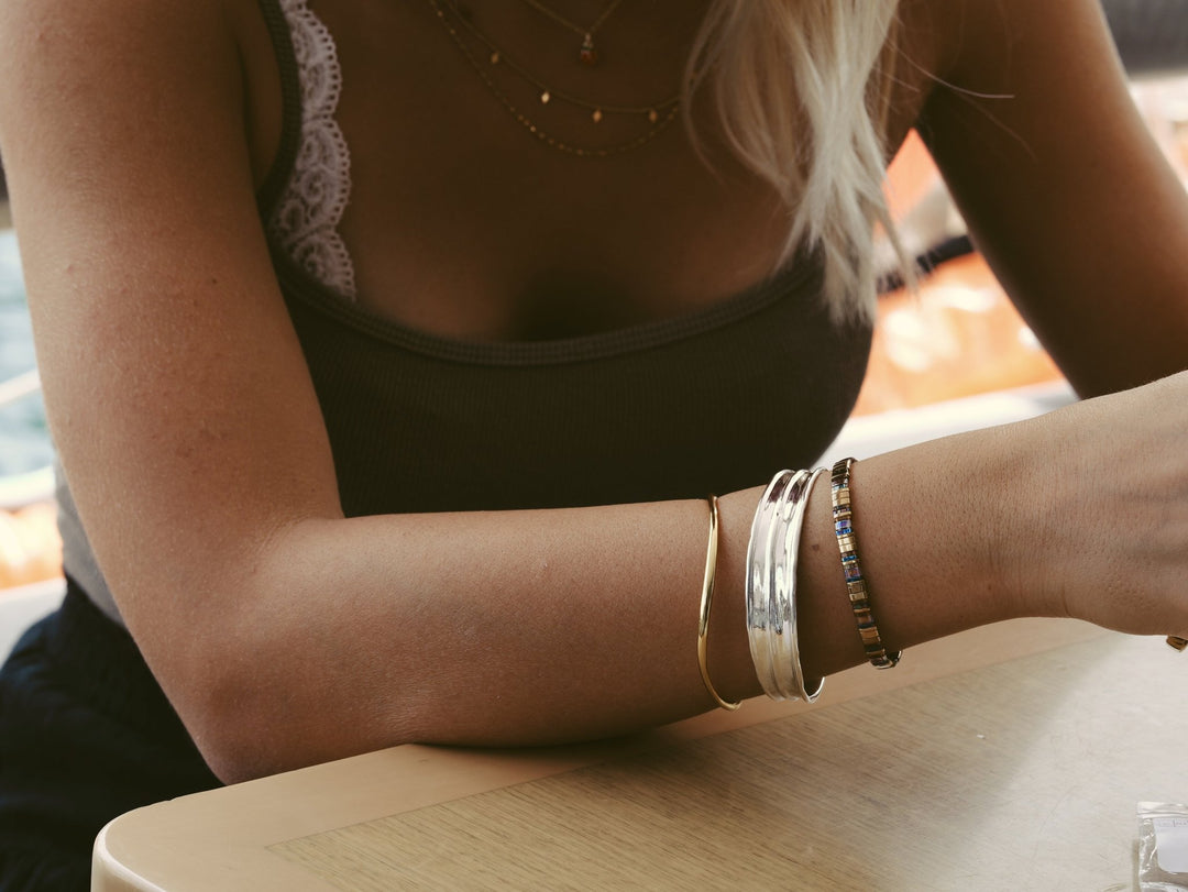 Wide silver bangle with handmade finish - Alicia&