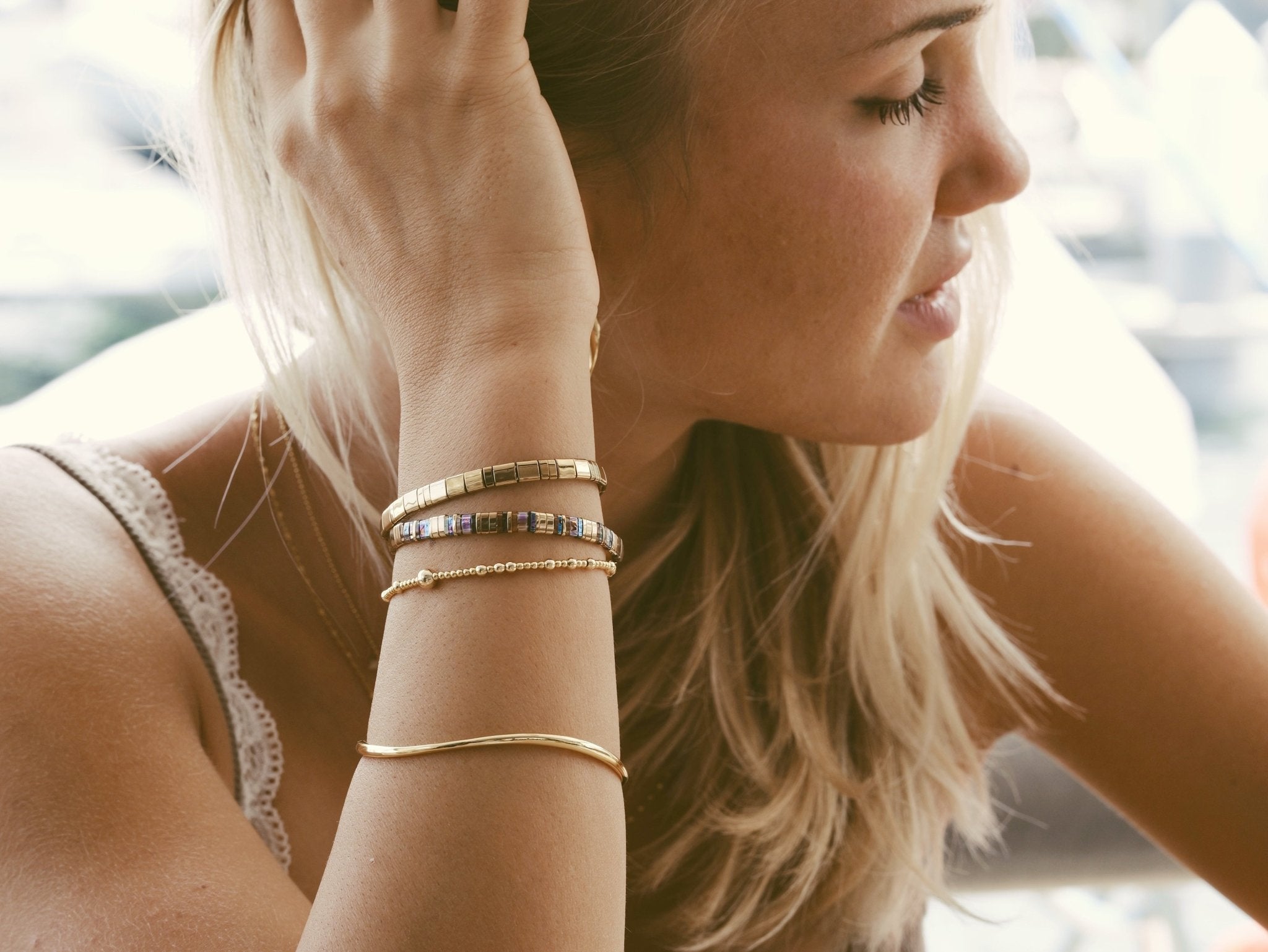 Which jewelry suits me, a gold bracelet with pearls or a minimalist bangle from Alicia's Diary, special jewelry