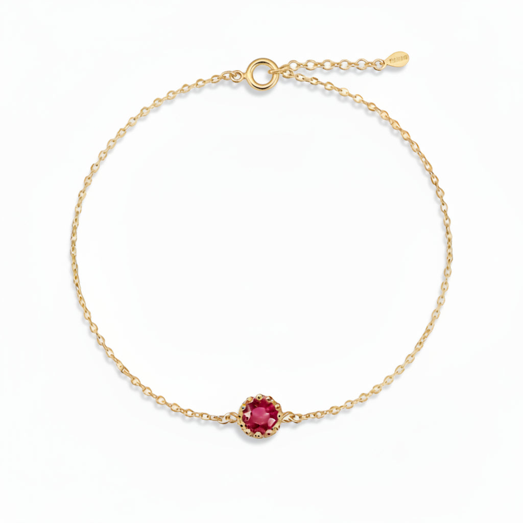 Delicate bracelet with raspberry-colored zircon in gold-plated silver