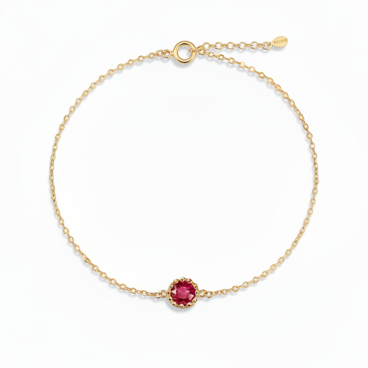 Delicate bracelet with raspberry-colored zircon in gold-plated silver