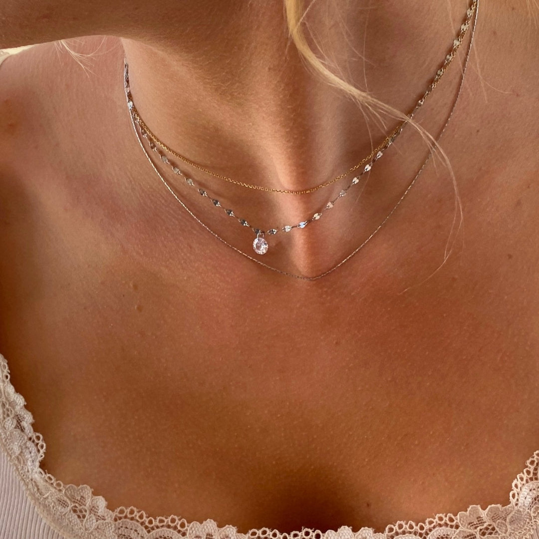 Silberne Edelstahl Halskette mit kleinem Diamant-Anhänger, wasserfester Schmuck für junge Frauen und Teenager